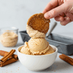 Dipping a homemade cinnamon crisp into a scoop of Cinnamon Ice Cream.