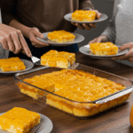 Serving square slices of the finished Mango Float at a party.