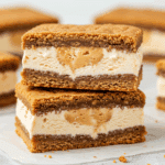 A finished Peanut Butter Blondie Ice Cream Sandwich cut in half to show the inside.