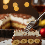 A beautiful slice of Chocolate Banana Pie being served at a festive party.