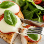 A plated serving of the finished Caprese Pan-Fried Frozen Chicken Breast.