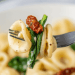 A forkful of the finished, creamy Goat Cheese Pasta.