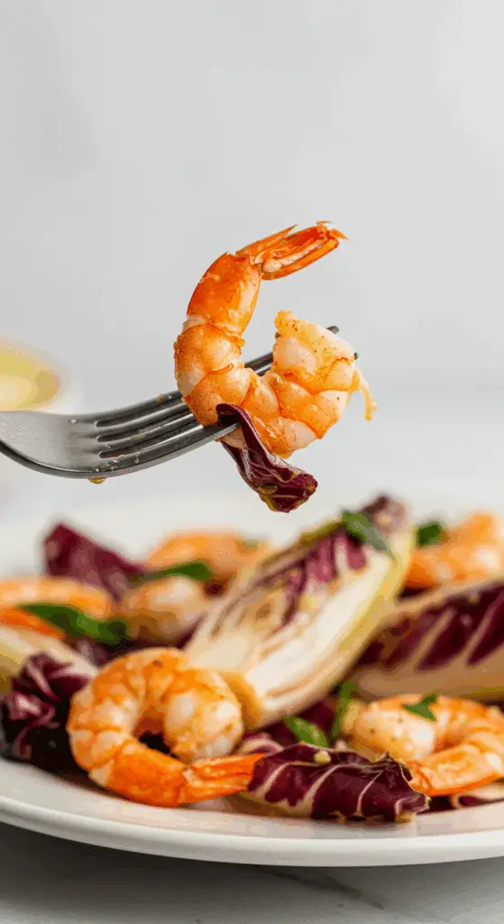 A forkful of the finished Grilled Radicchio and Shrimp Salad.