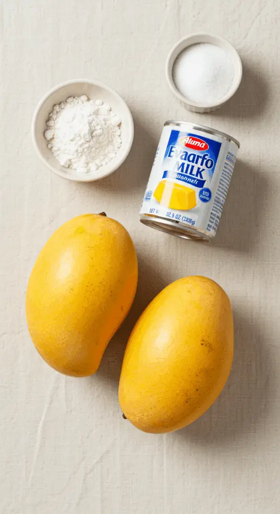The 4 simple, fresh ingredients for the Hong Kong-style Mango Pudding recipe.