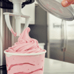 The perfectly creamy Strawberry Cottage Cheese Ice Cream inside the Ninja Creami pint after a Re-Spin.