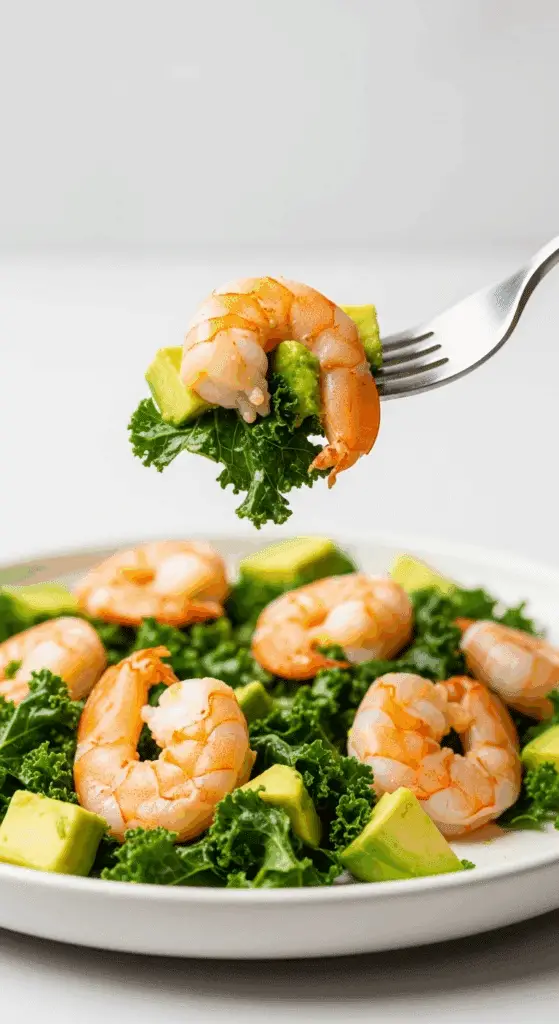 A forkful of the finished Grilled Shrimp and Avocado Salad.