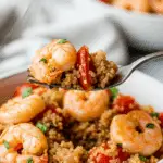 A healthy and delicious serving of the finished Shrimp and Quinoa Skillet in a bowl.