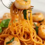 A forkful of the finished Spicy Scallop Pasta.