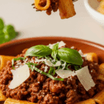 A delicious serving of the finished Rigatoni with Summer Bolognese in a bowl.