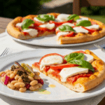 A slice of Caprese Pizza served with a side of cannellini bean salad.