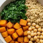 A beautiful and healthy grain bowl featuring a generous serving of homemade Roasted Butternut Squash.