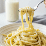 An elegant plate of homemade, creamy Cottage Cheese Pasta being enjoyed for a healthy and satisfying weeknight dinner.