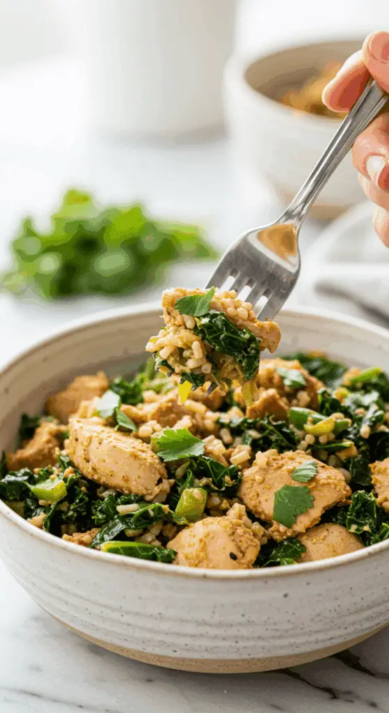 A beautiful bowl of homemade, healthy Turkey Kale Rice Bowl being served for a delicious weeknight dinner.