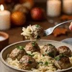 A cozy bowl of homemade, creamy Turkey Sage Meatballs and Orzo being enjoyed for a casual family dinner.