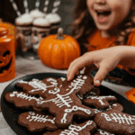 A large platter of homemade, spooky, and fun Chocolate Skeleton Cookies being served at a fun and casual Halloween party.